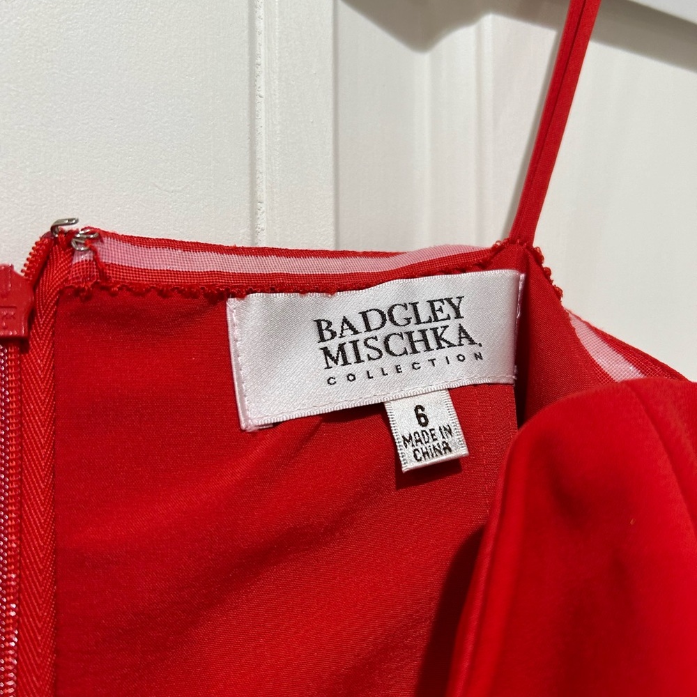 A long Badgley Mischka collection red dress